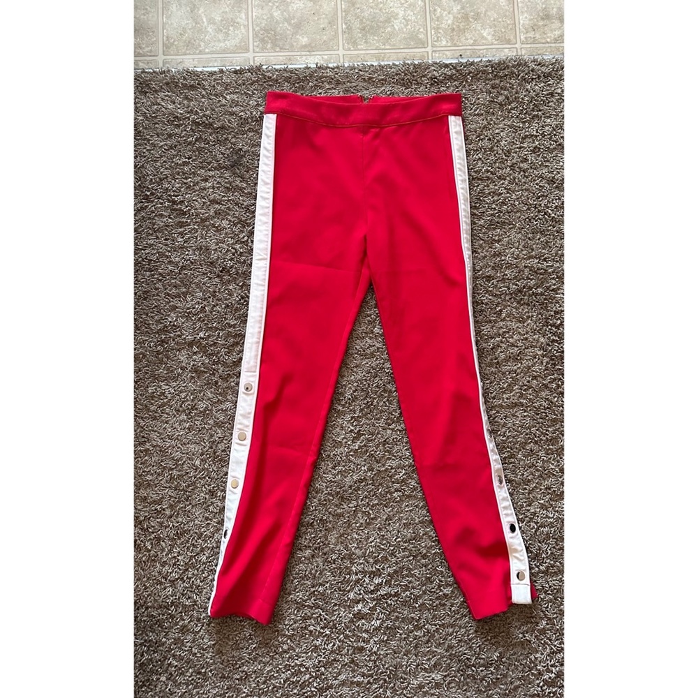 Skinny leg, red tear away pants